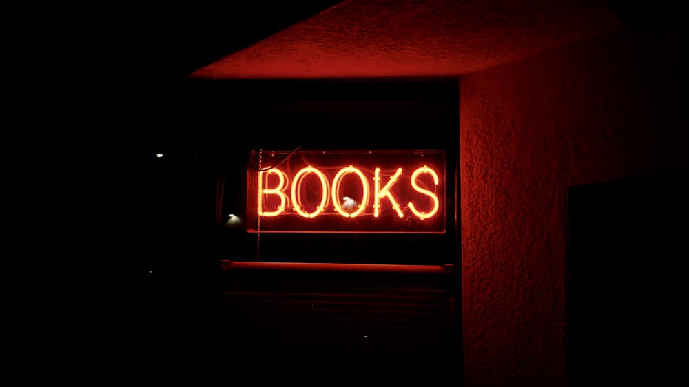 red and black open neon signage