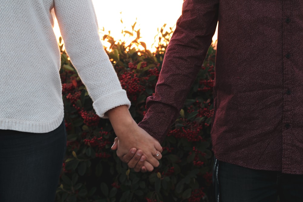 person in red and white long sleeve shirt