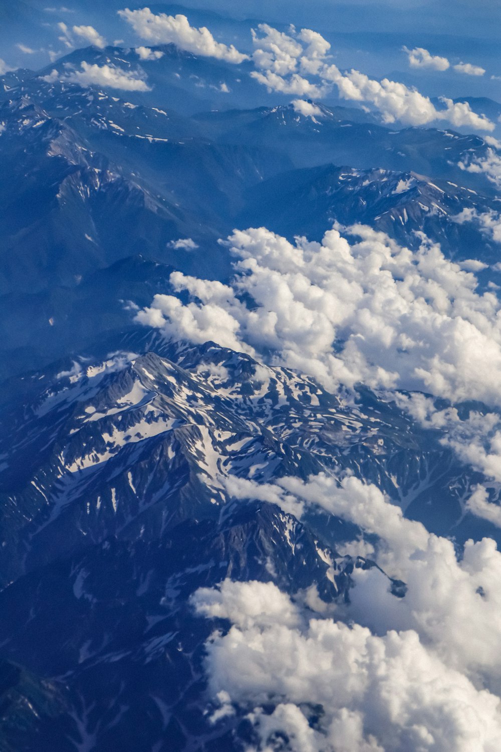 aerial view of snow covered mountain during daytime