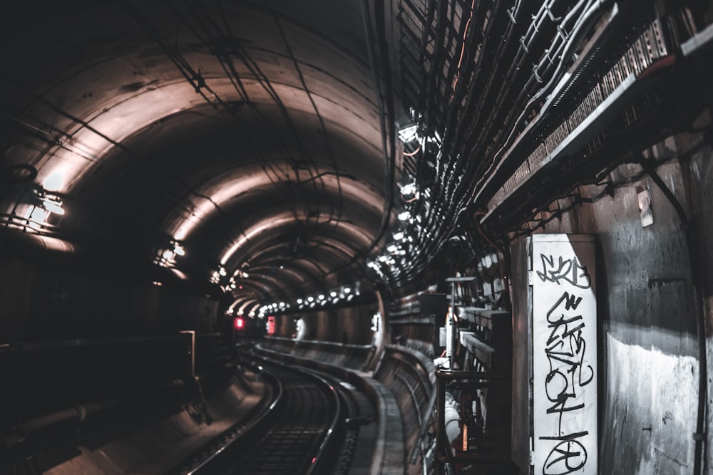 black and white tunnel with lights