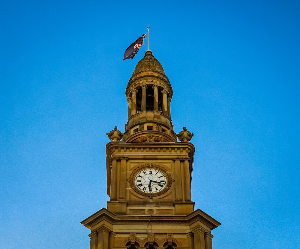 brown and white clock tower
