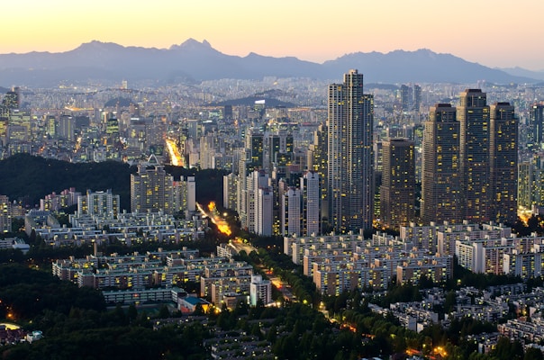 aerial view of city buildings during sunset