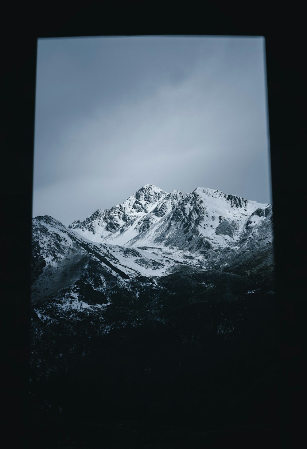 snow covered mountain under blue sky