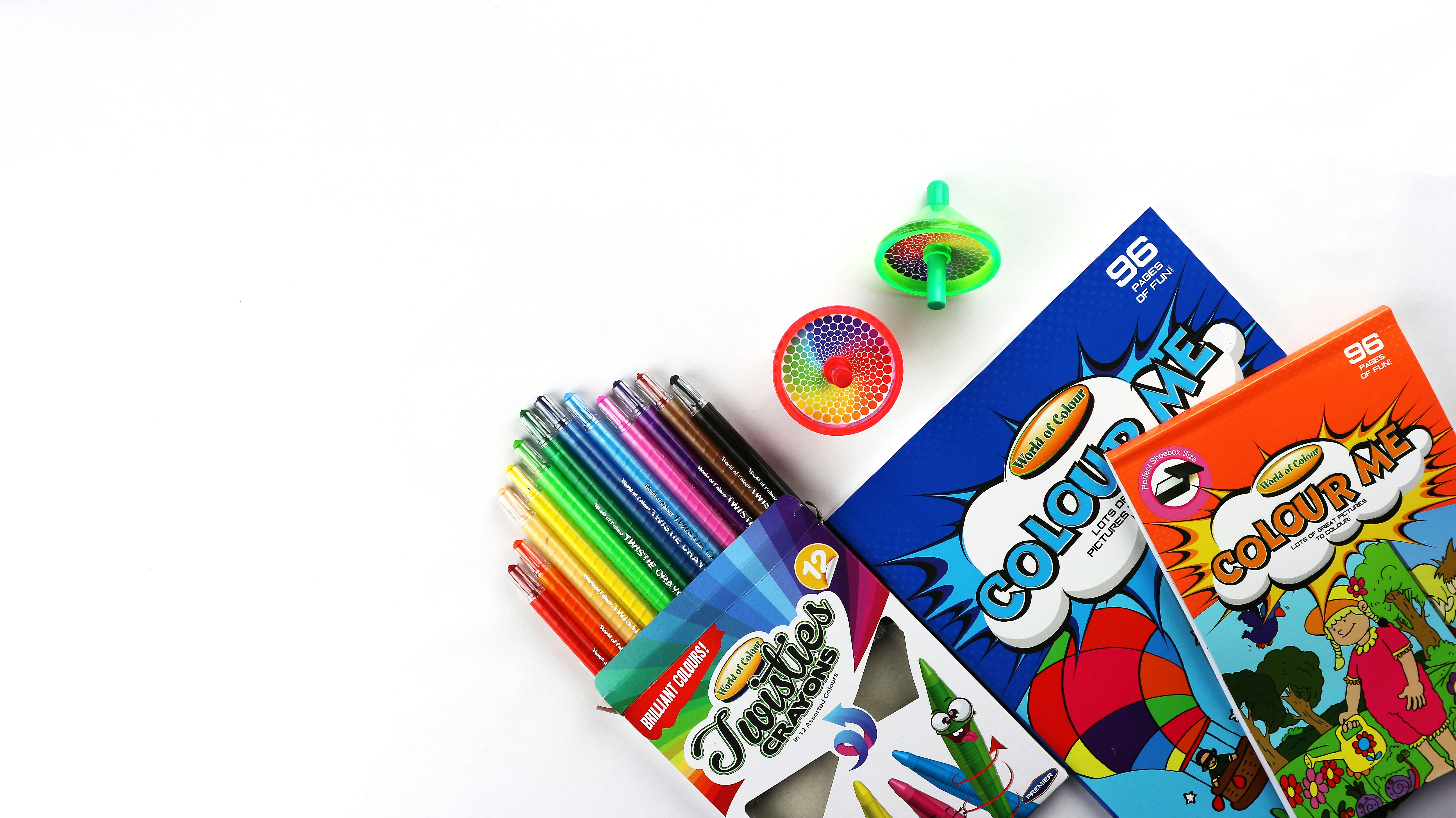 Kids engaged in creative craft activities with colorful materials