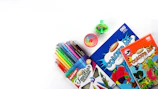 assorted color coloring pencils on white table