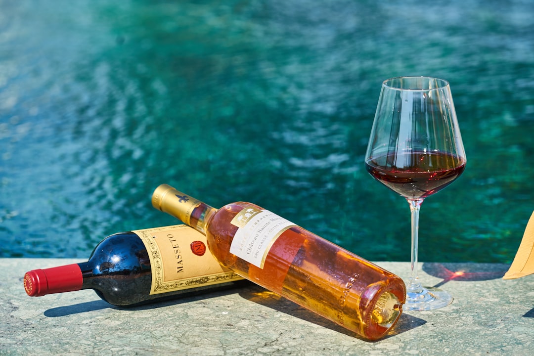 wine bottle and wine glass on table, Wine