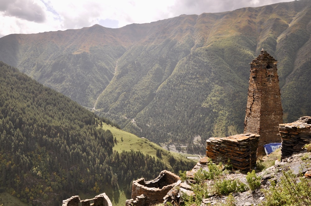 brown brick wall on top of mountain during daytime