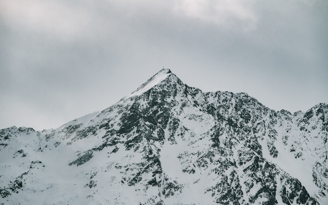 snow covered mountain during daytime