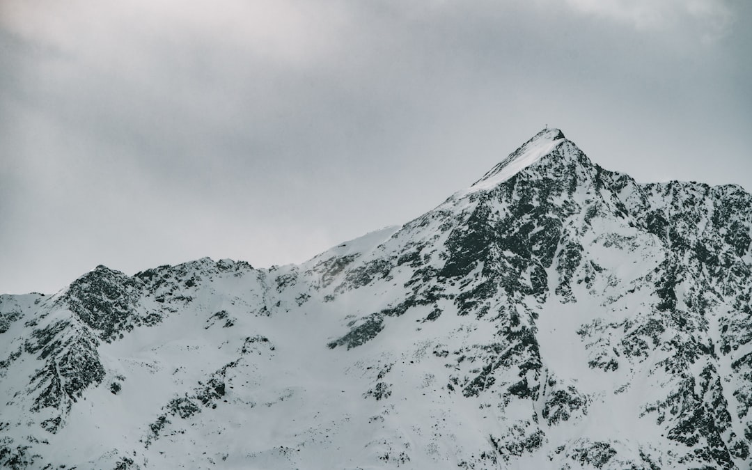 snow covered mountain during daytime