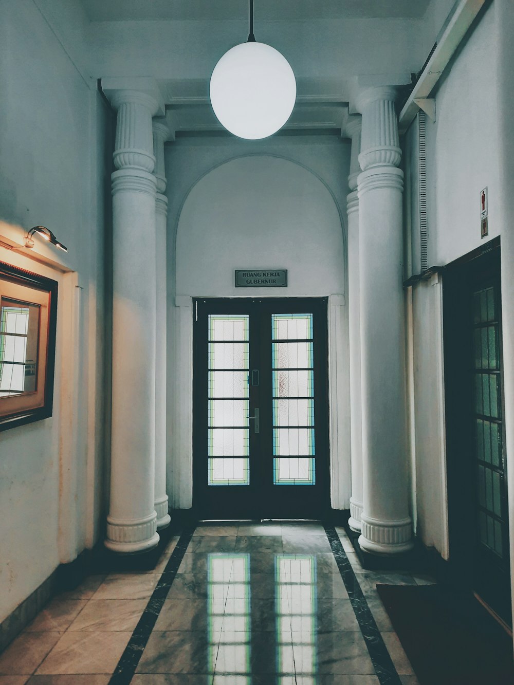 black wooden framed glass window