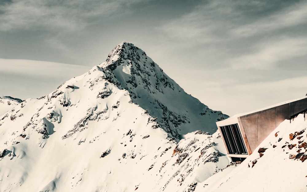 snow covered mountain during daytime