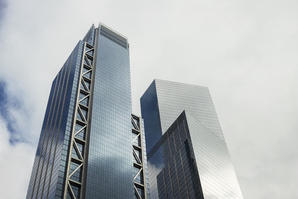 blue glass walled high rise building