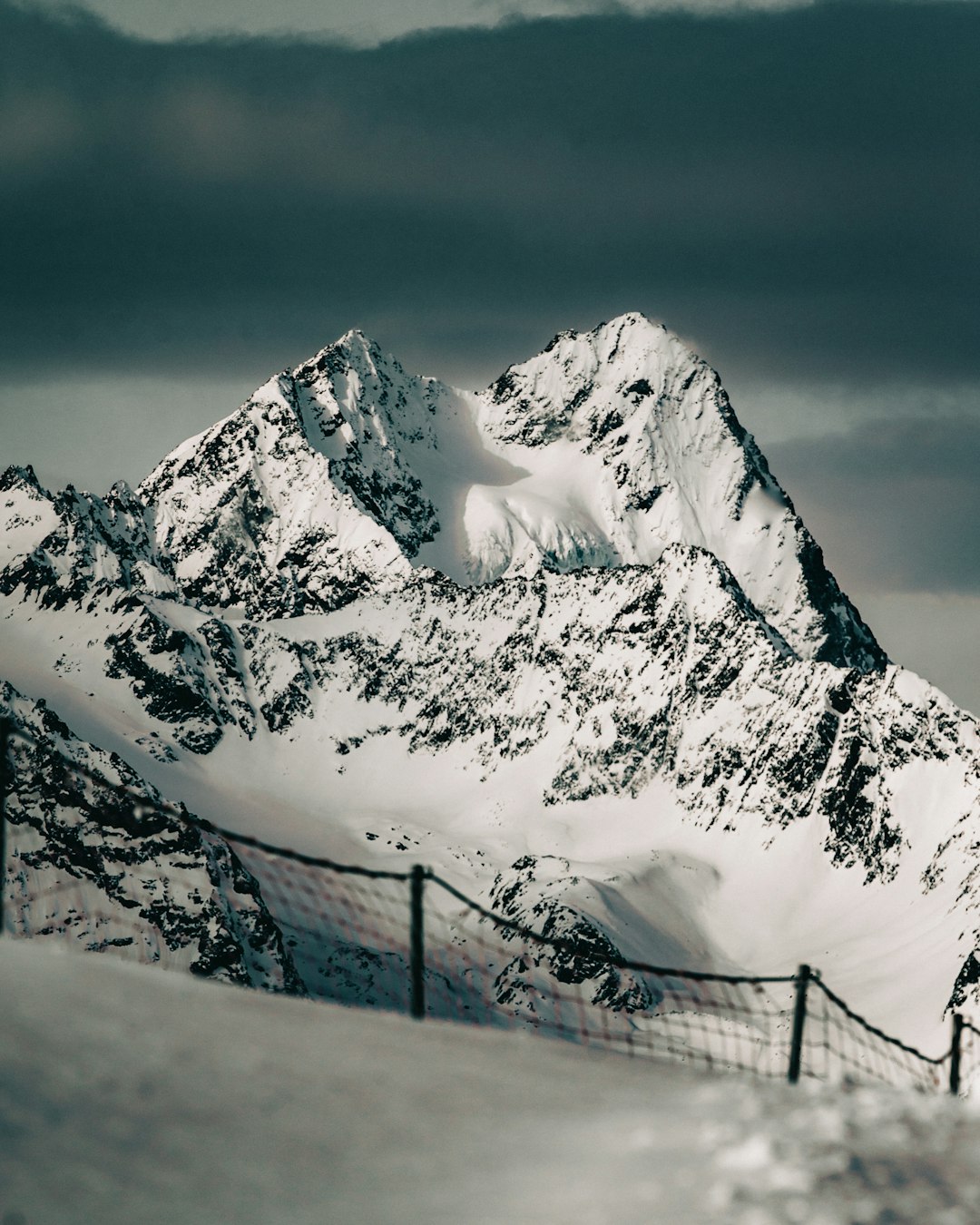 snow covered mountain during daytime