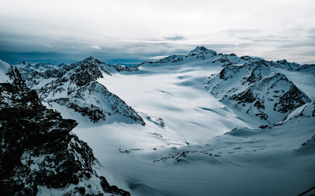 snow covered mountain during daytime