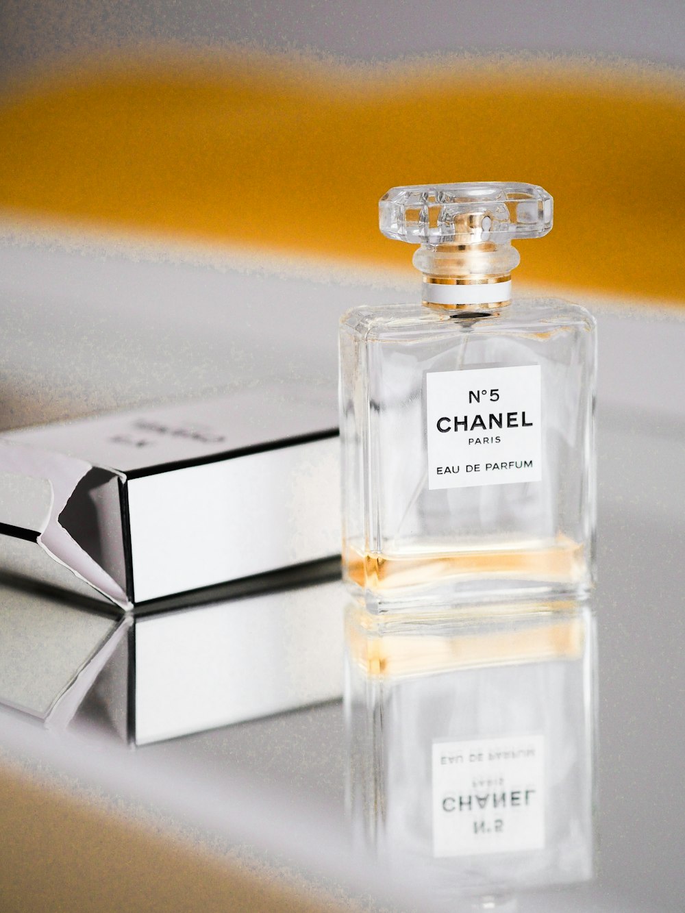 clear glass perfume bottle with box
