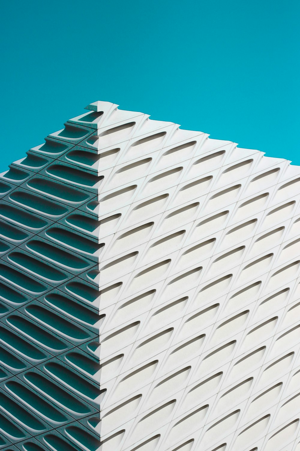 white concrete building under blue sky during daytime