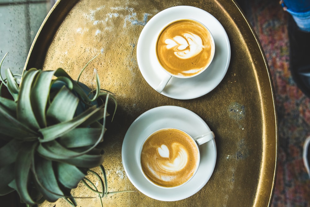 white ceramic cup with saucer