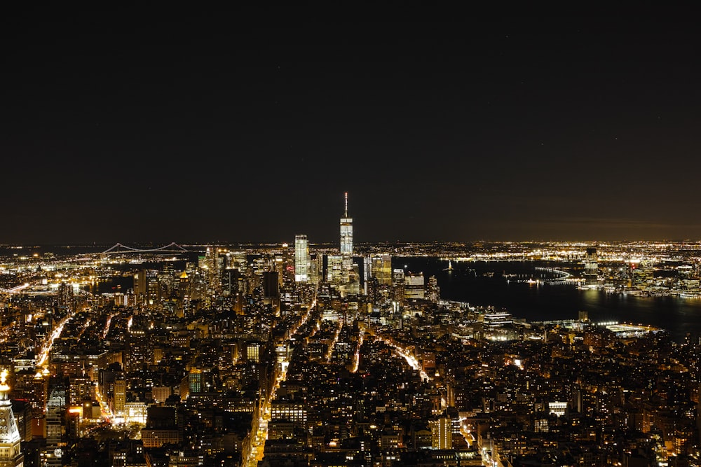 city with high rise buildings during night time