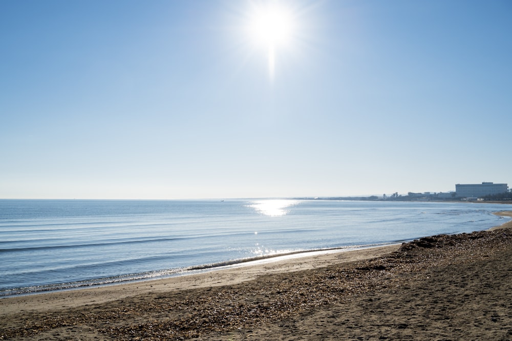 blue sea under blue sky during daytime