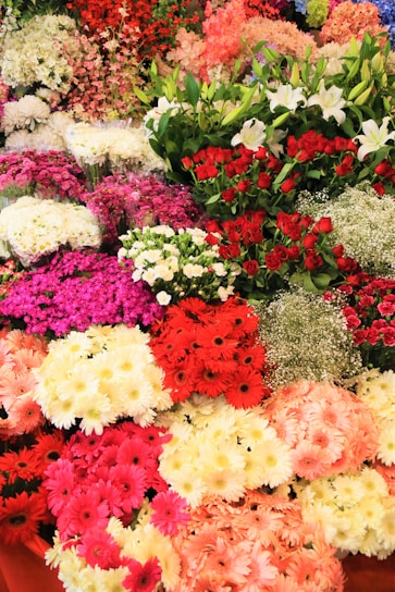 A beautiful floral arrangement showcasing various types of bouquets from Delia Florist.