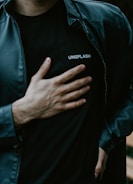 man in black adidas zip up jacket