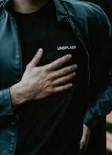 man in black adidas zip up jacket