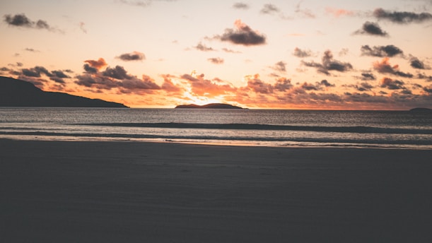 A breathtaking sunset over a tropical beach.