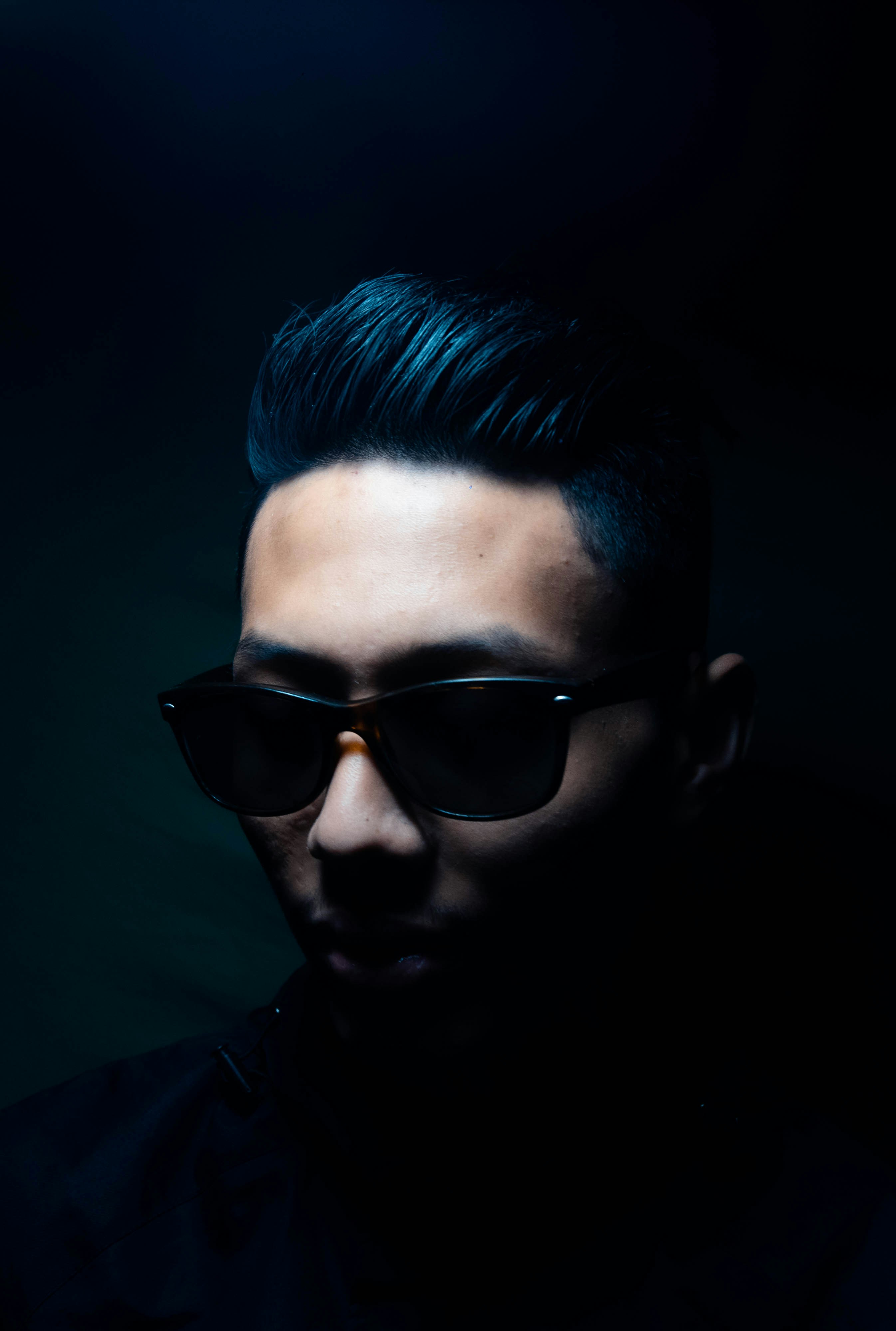 man in black sunglasses with blue hair photo – Free Black Image on Unsplash