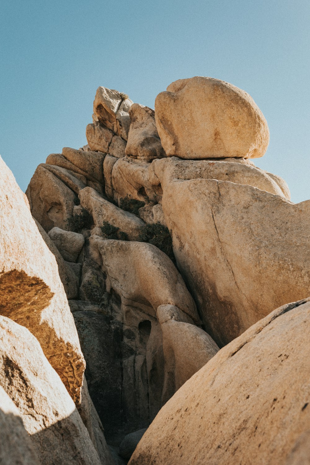 brown rock formation under blue sky during daytime