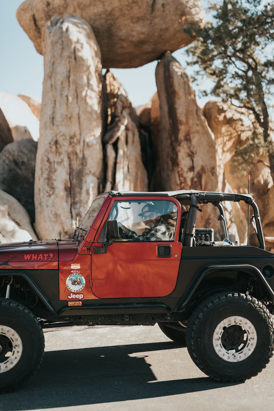 red and black jeep wrangler