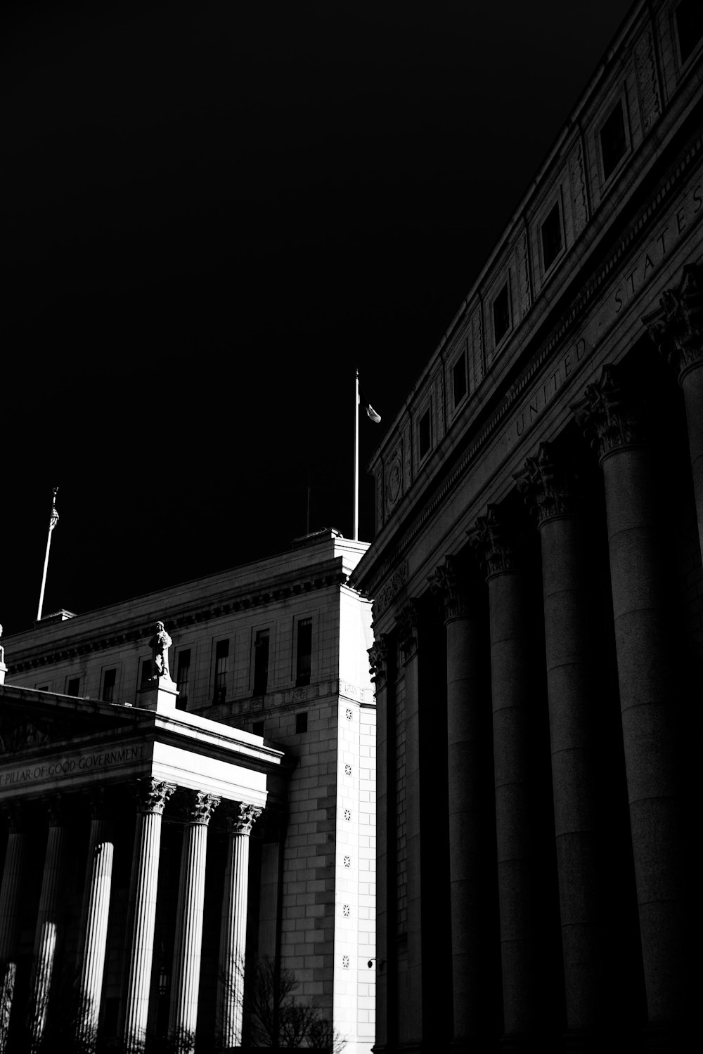 grayscale photo of concrete building