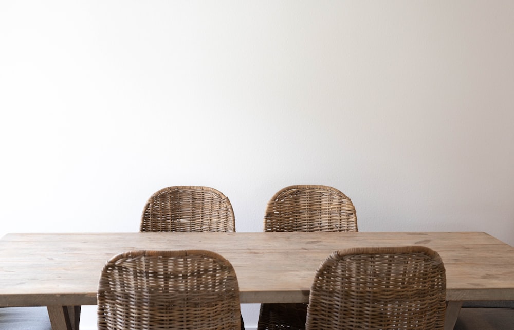 brown wooden table with chairs