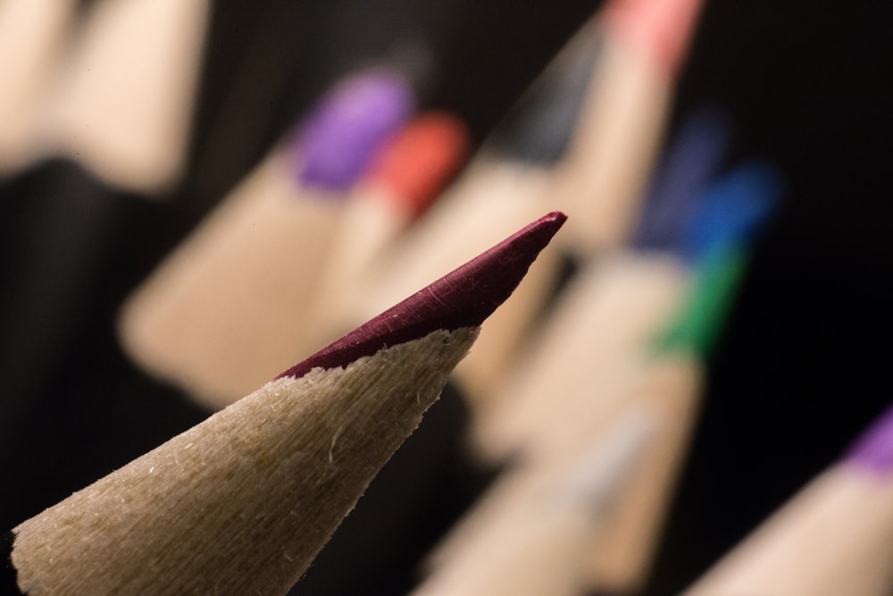 brown wooden stick with purple color