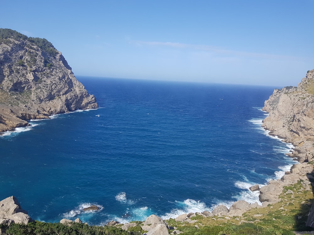 a large body of water surrounded by mountains