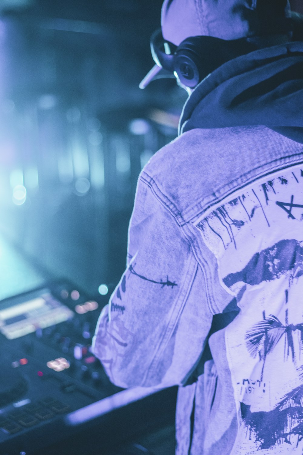 person in blue denim jacket