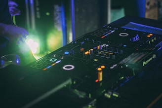 black and green audio mixer