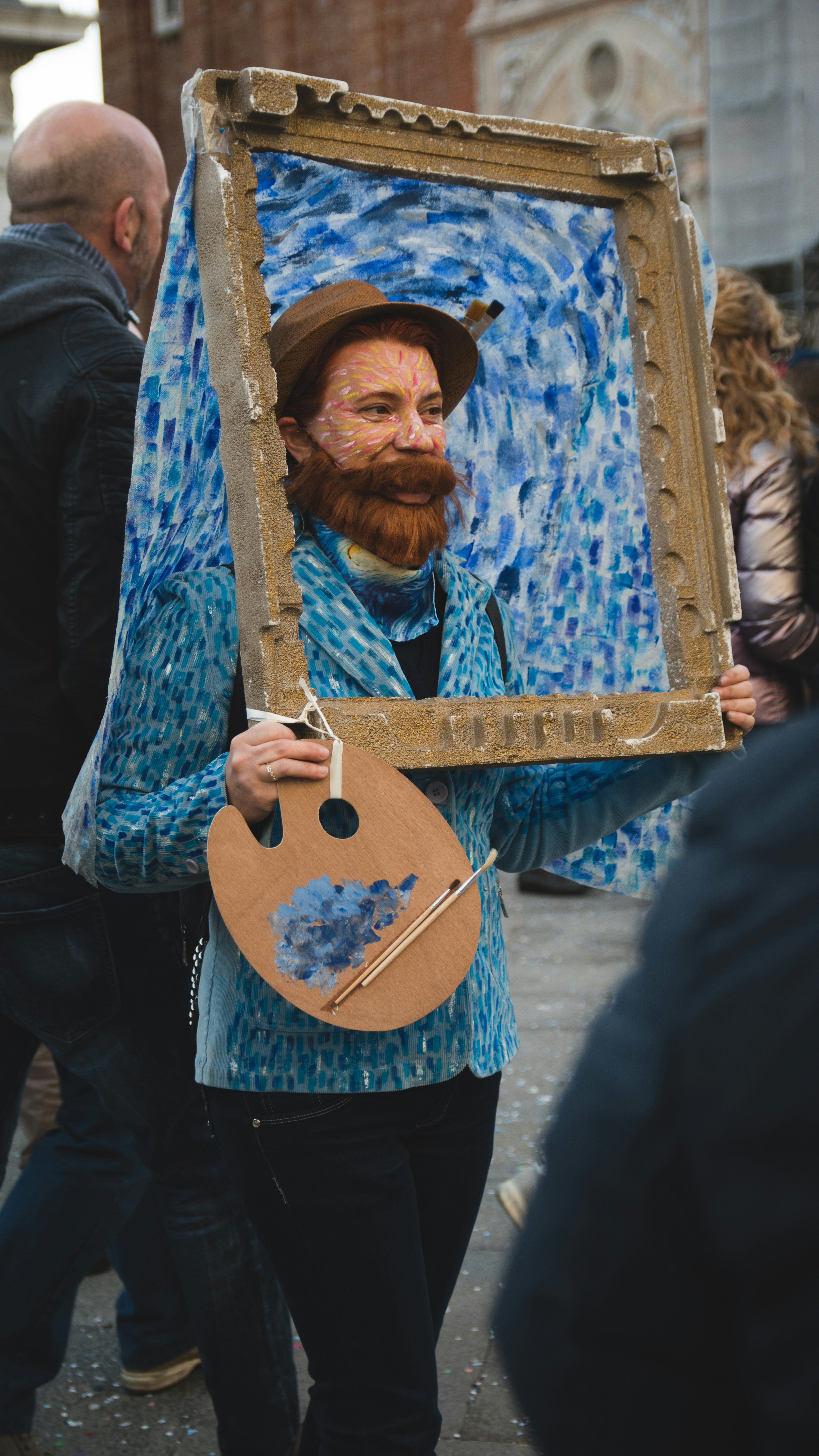 Person adding paint details to a costume