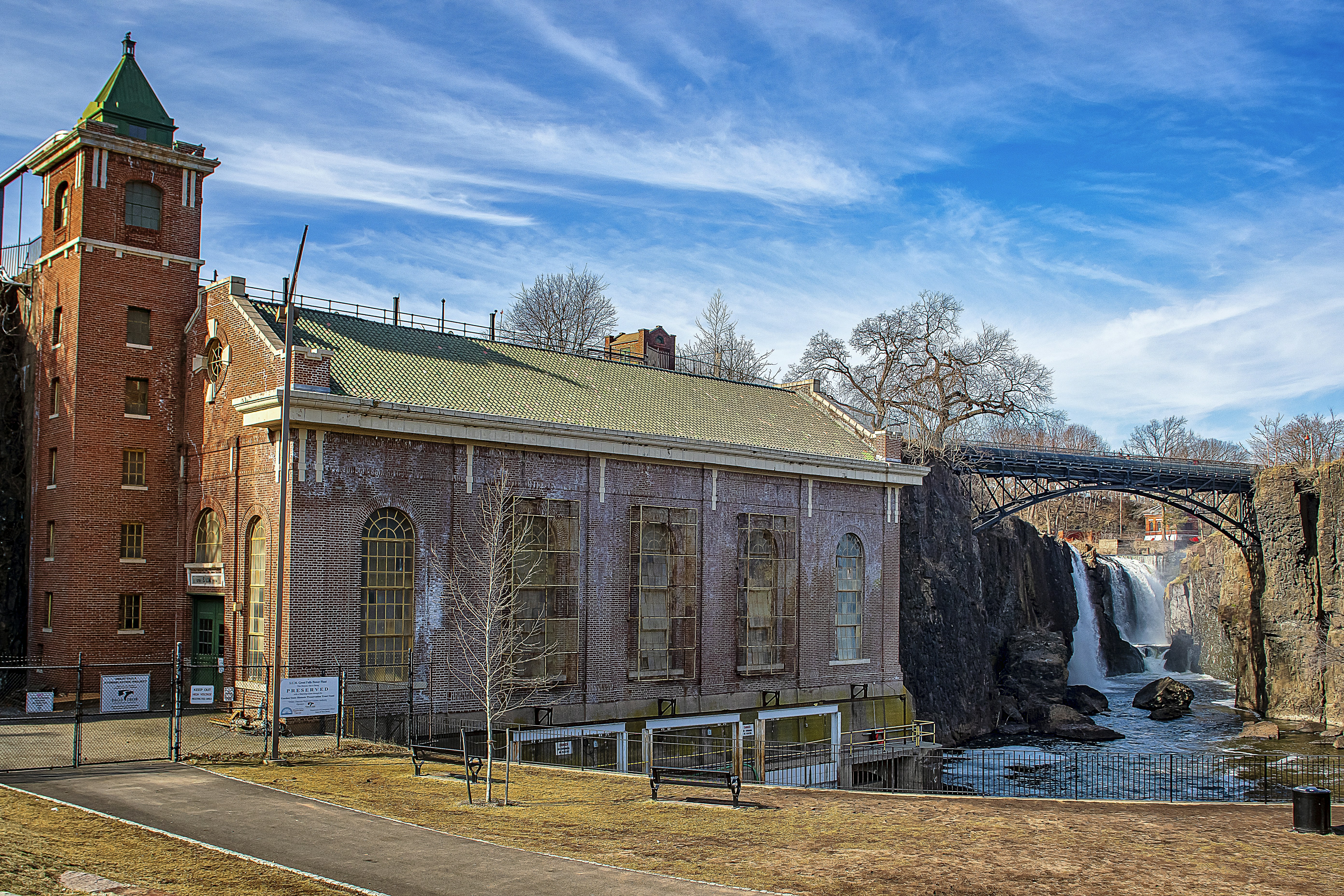 brown concrete building under blue sky during daytime