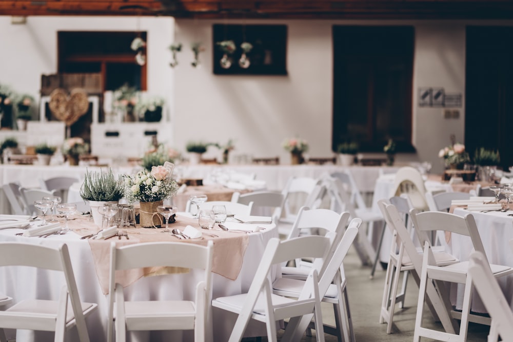 white wooden chairs and table