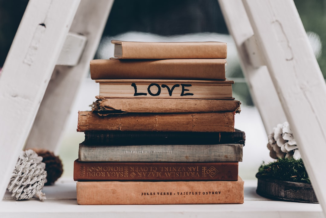 brown and black hardbound books