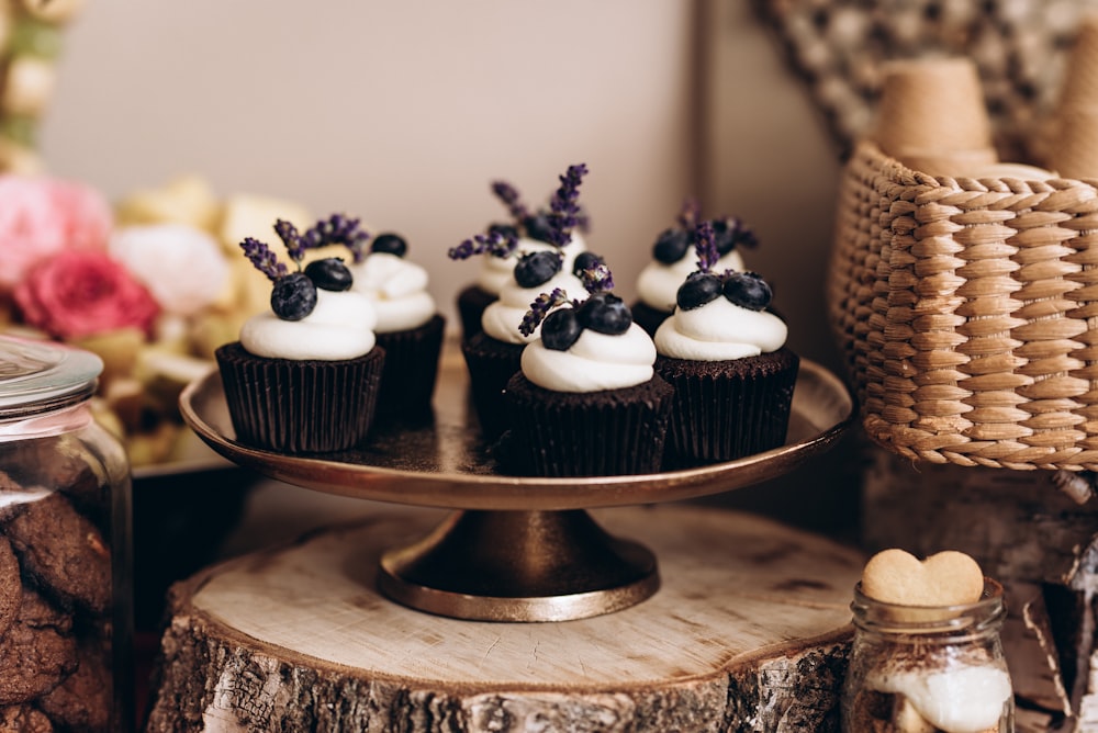 cupcakes on brown wooden round tray