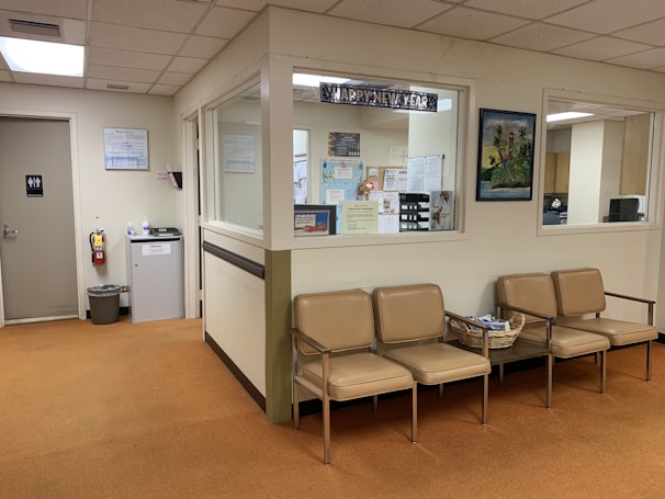 brown and white padded armchairs in a medical office cleaned professionally by a janitorial service