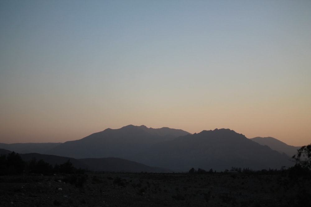 silhouette of mountains during daytime