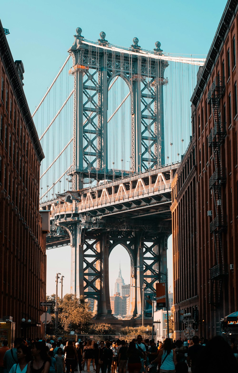 gray bridge under blue sky during daytime