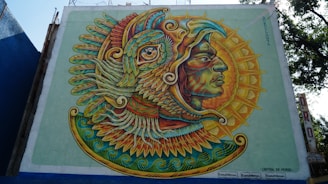 A vibrant mural depicting a phoenix rising, symbolizing rebirth and transformation.