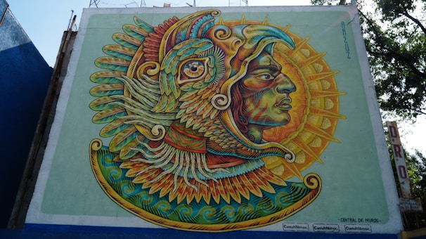 A vibrant mural depicting a phoenix rising, symbolizing rebirth and transformation.