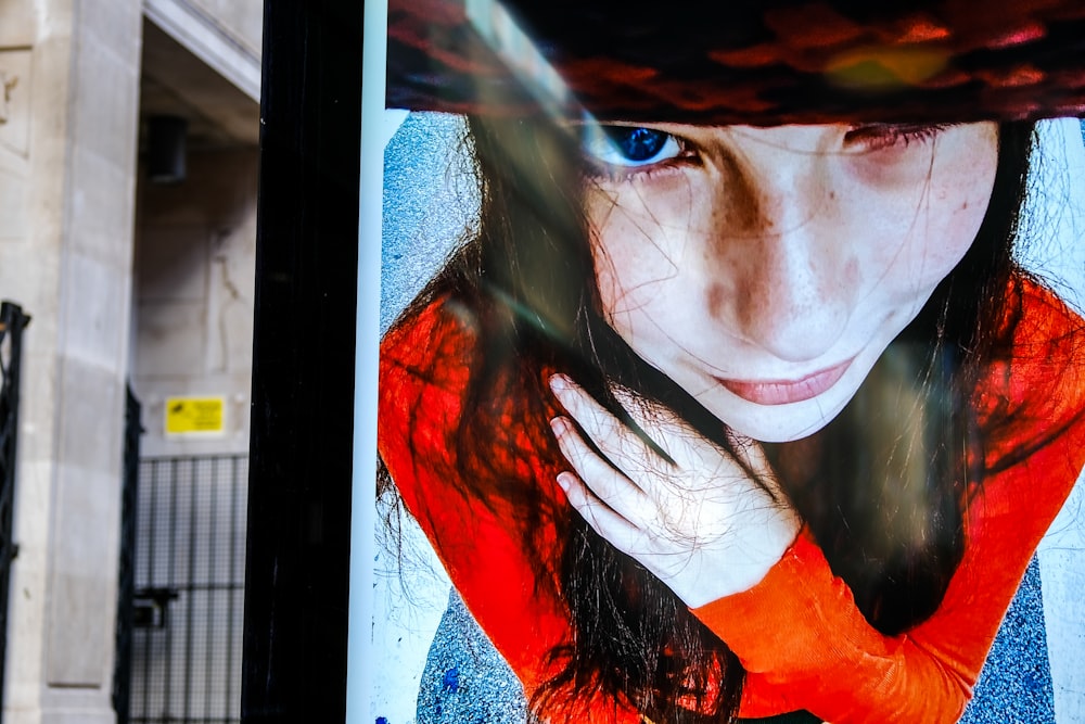 woman in blue and red shirt