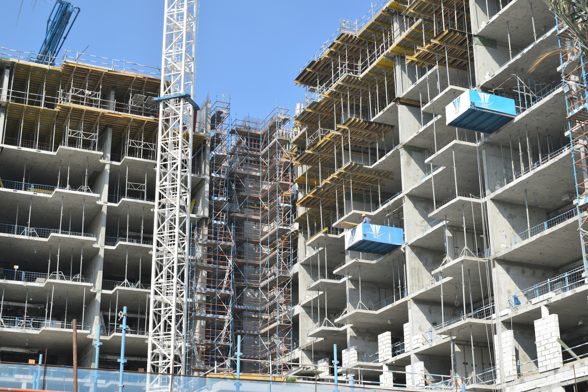 white and blue concrete building during daytime