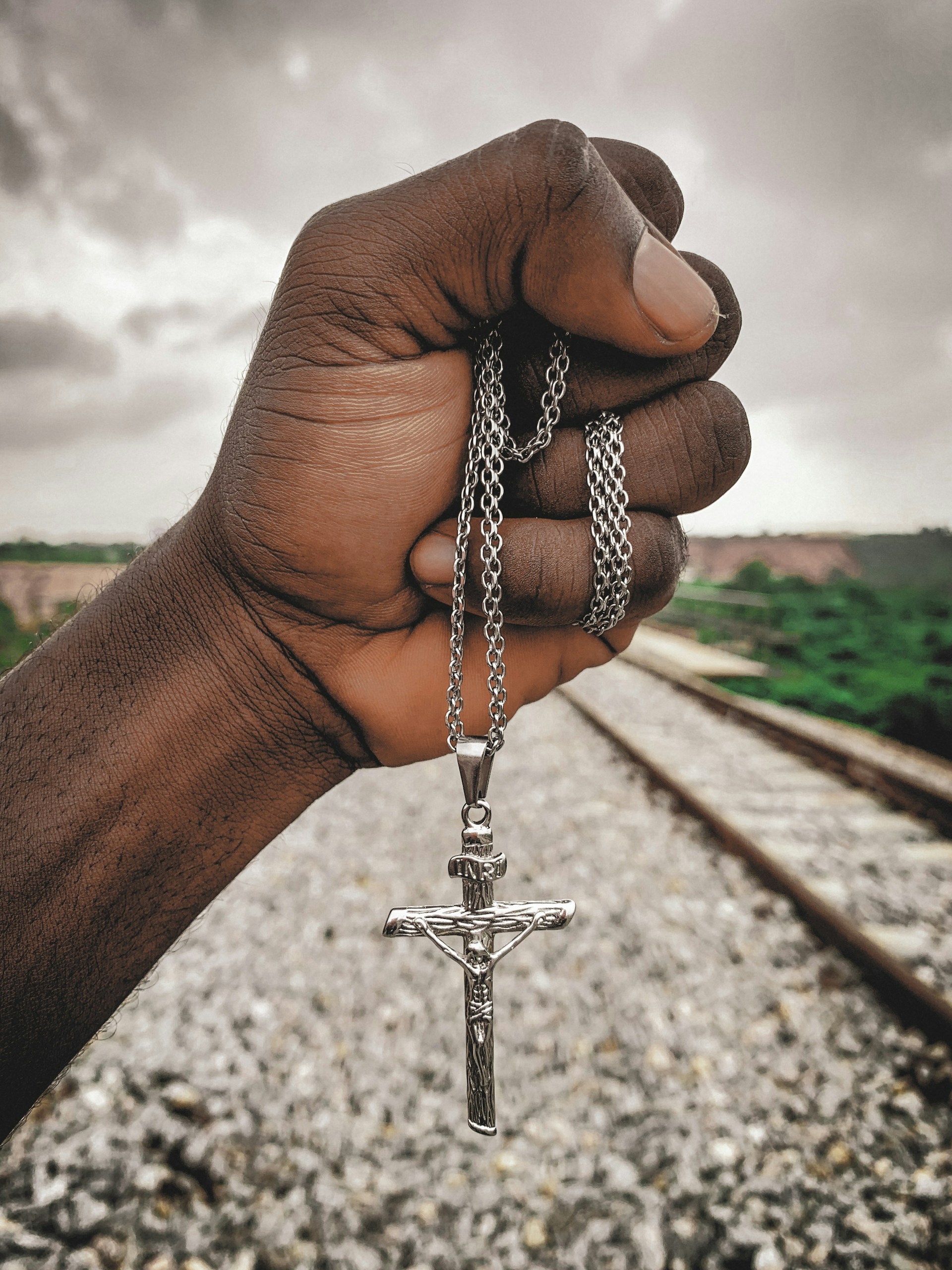 woman wearing yellow long-sleeved dress under white clouds and blue sky during daytime