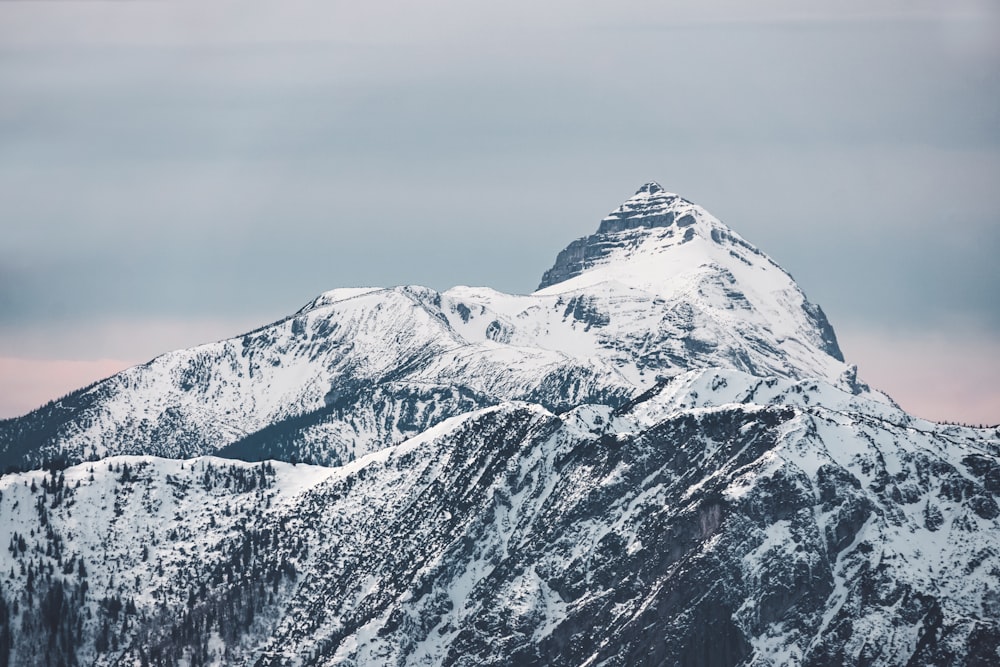 snow covered mountain during daytime